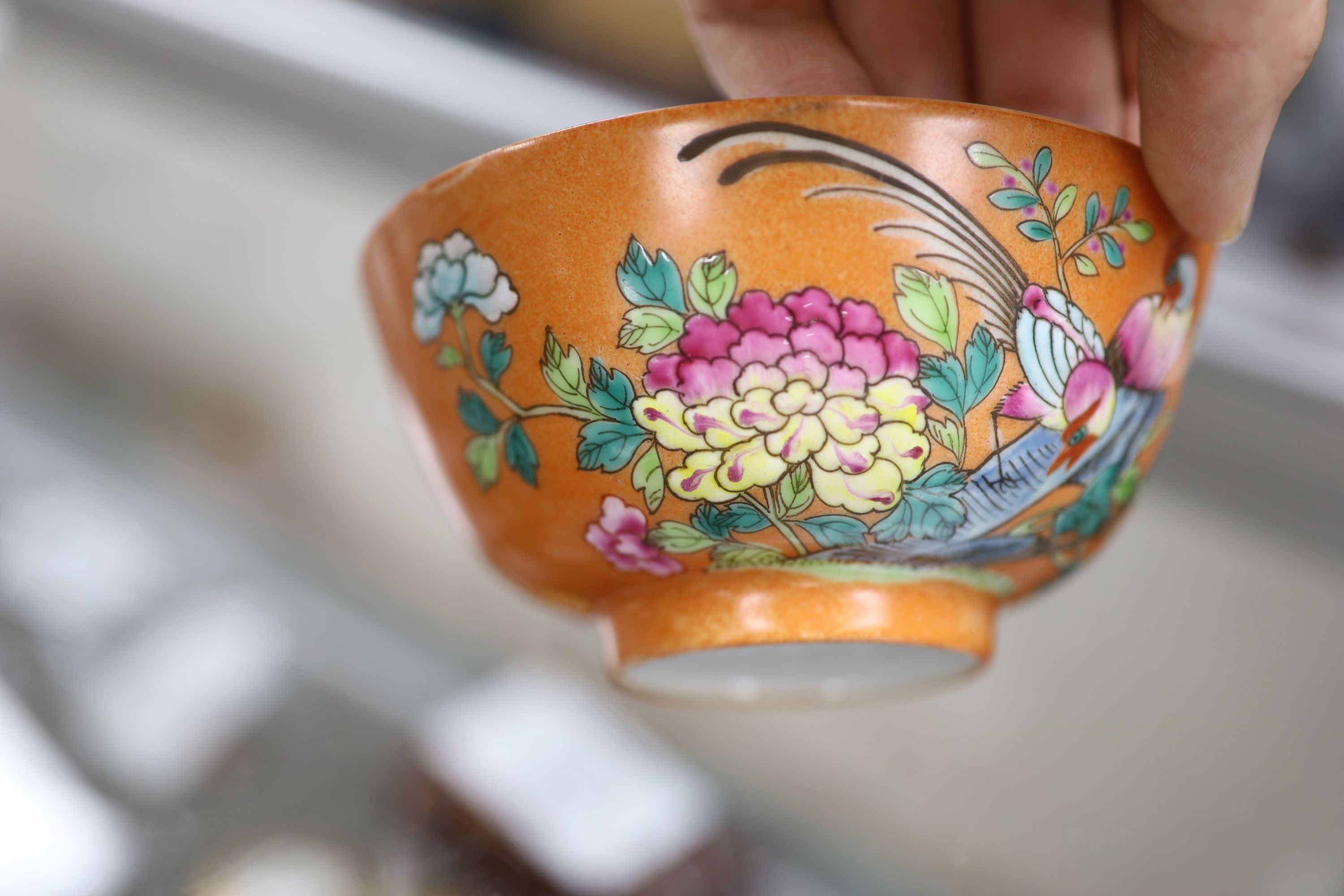 A Chinese orange ground bowl, diameter 11.5cm